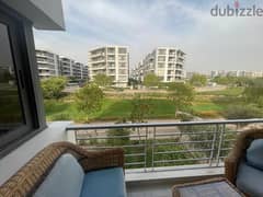 3-bedroom apartment for sale in installments over the longest payment period in the settlement in front of the international airport, Taj City Compoun