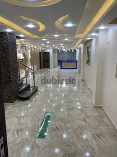 Duplex for sale, ultra super luxury, Al Ferdous villas, in front of Dreamland