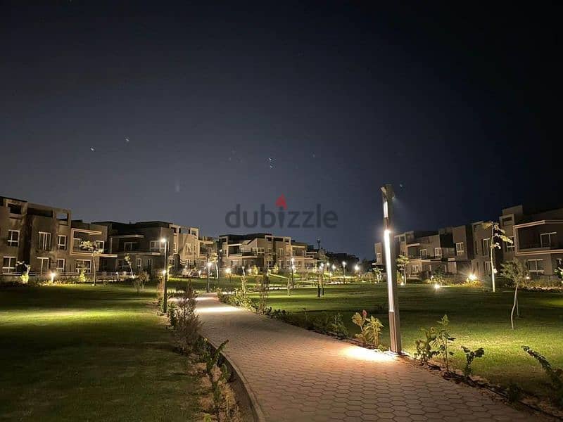 Distinctive 135 meter apartment for sale, fully finished, distinctive view, private garden, in Sheikh Zayed, next to Mountain View and October Plaza 2