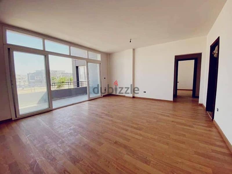 Distinctive 135 meter apartment for sale, fully finished, distinctive view, private garden, in Sheikh Zayed, next to Mountain View and October Plaza 7
