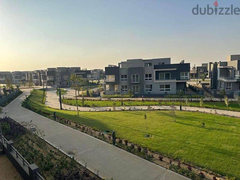 Distinctive 135 meter apartment for sale, fully finished, distinctive view, private garden, in Sheikh Zayed, next to Mountain View and October Plaza 12