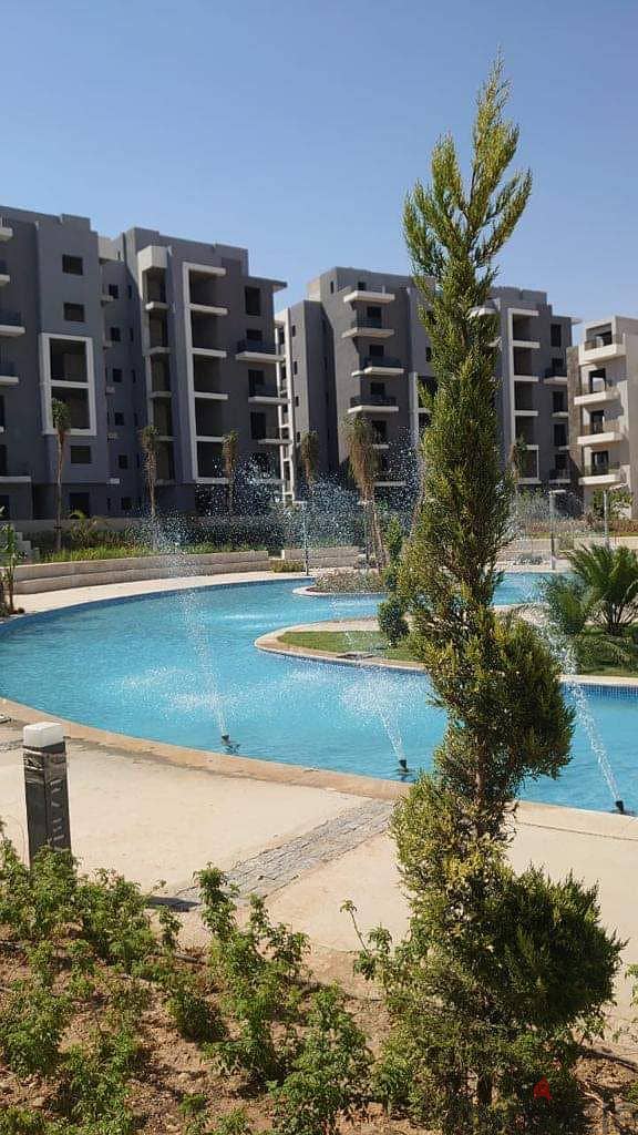 Apartment for sale in a garden in Sun Capital October compound, minutes from Mall of Egypt 5
