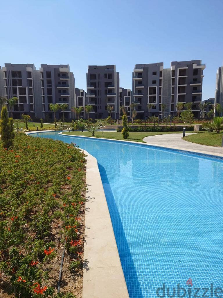 Receive immediately with 10% down payment in a 156-meter, 3-bedroom apartment with a garden view in Sun Capital Compound 6