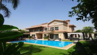 An independent villa for sale in the most prestigious compounds in the community, Swan Lake Hassan Allam Compound