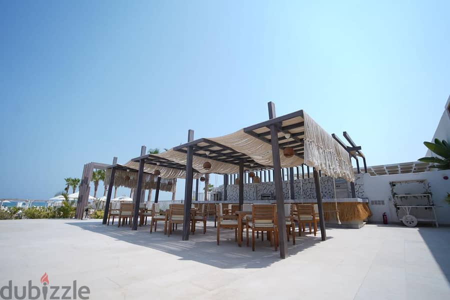 CHALET FOR SALE IN AZHA NORTH, RAS AL HEKMA Fully finished first row lagoon Installments 8 Y 5