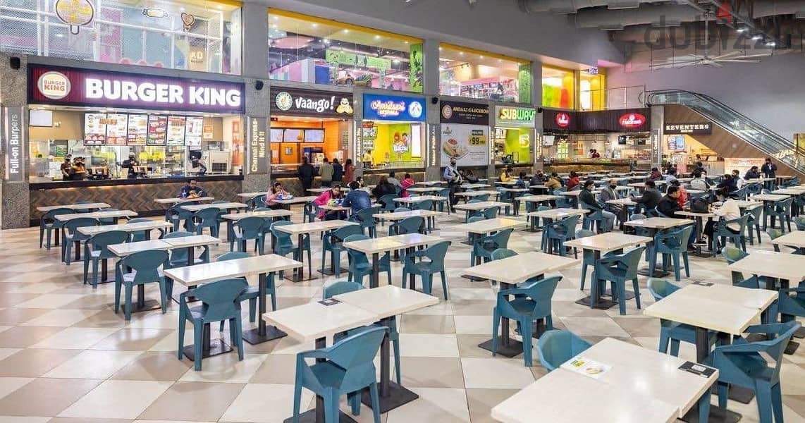 Immediate receipt of a store for sale in Food Court View, the iconic tower, direct on Al Amal Axis, with a 5% discount and 7 years installments. 6