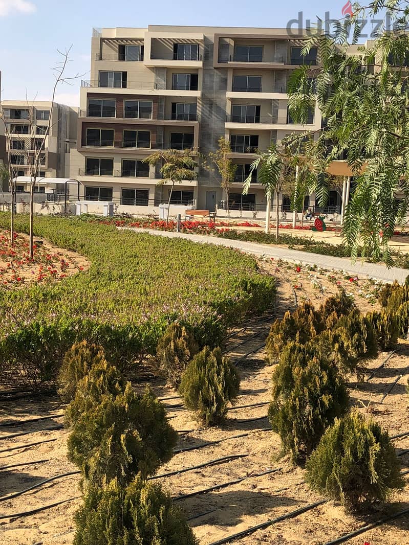The lowest down payment for an apartment 176 sqm with a garden 75 sqm, with installments, in Palm Hills New Cairo View Landscape 5
