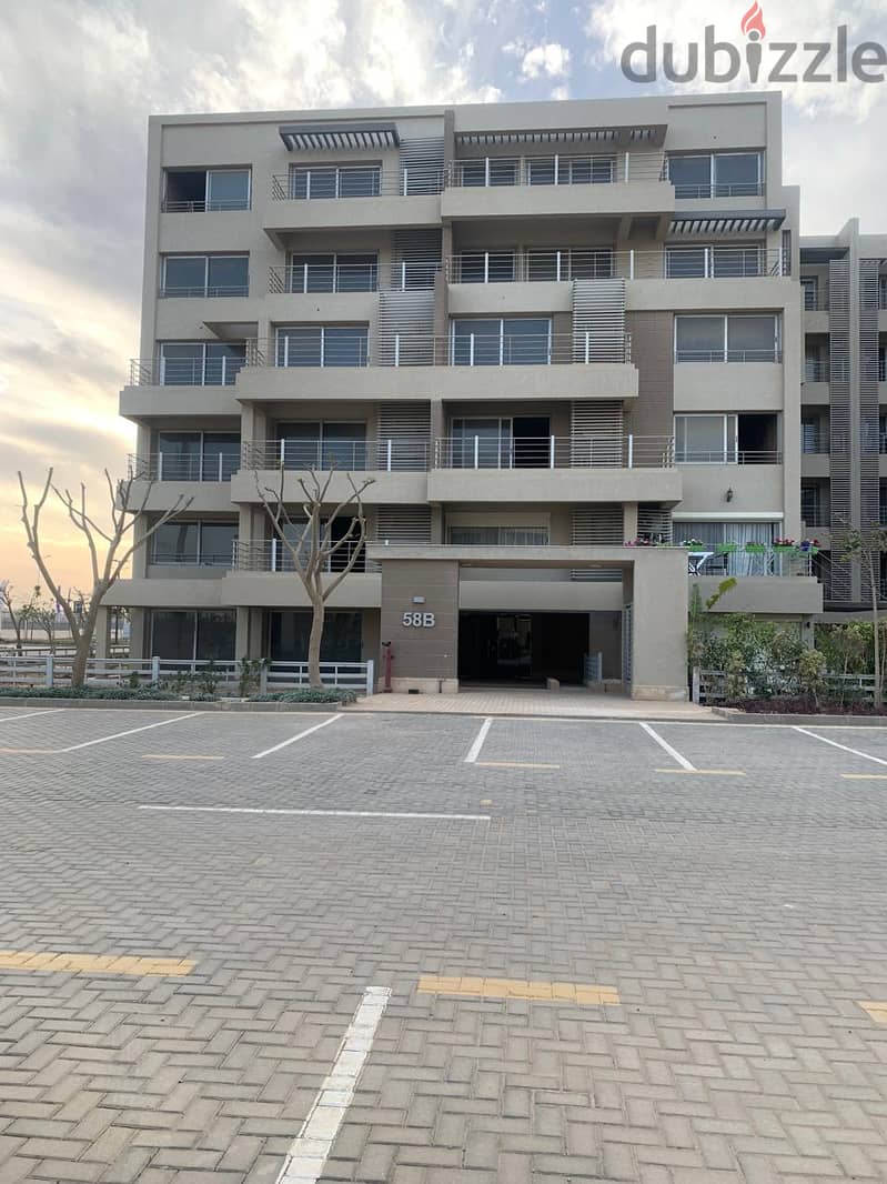 for sale apartment in palm hills capital garden 165m 2bed room directly from owner ready to move very prime location and view less than company price 2