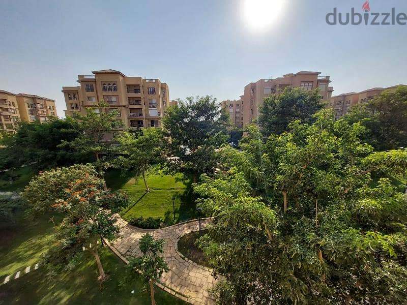 Apartment for sale in Madinaty, 250 square meters with a wide garden view, located in B1 phase, adjacent to the largest service complex. 2