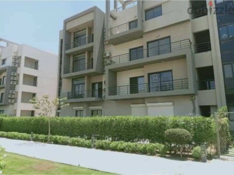 Apartment for sale in Al Marasem Compound, 3 bedrooms ,ready to move with installments, finished with air conditioners landscaped view 11