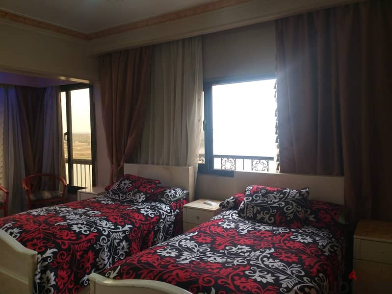 Apartment 135 meters with a view on the Nile for sale in Maadi Corniche, police buildings 12