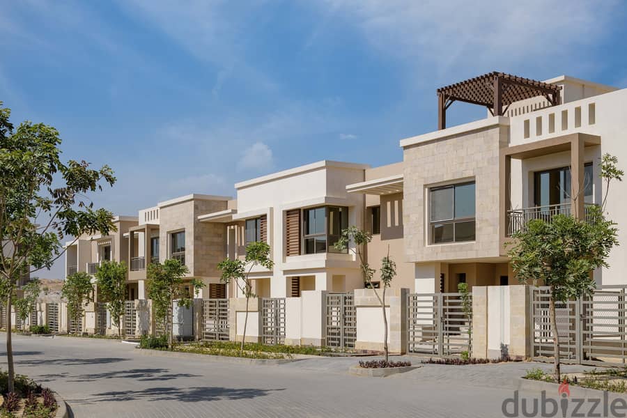 Townhouse villa 160 sqm corner for sale in the last stage of villas in Taj City Compound at a fantastic price in front of Cairo International Airport 2