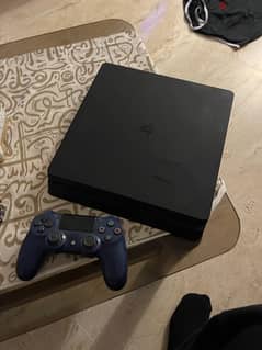 PlayStation 4 slim with games