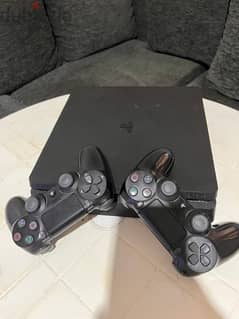 PS4 with 2 Controllers & 6 Games