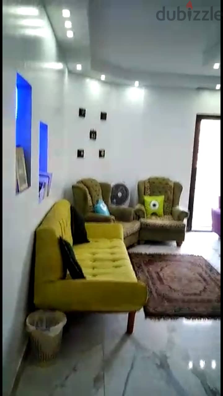 Ground floor apartment with garden, excellent location in Al-Fardous City, Al-Zohour Compound 4