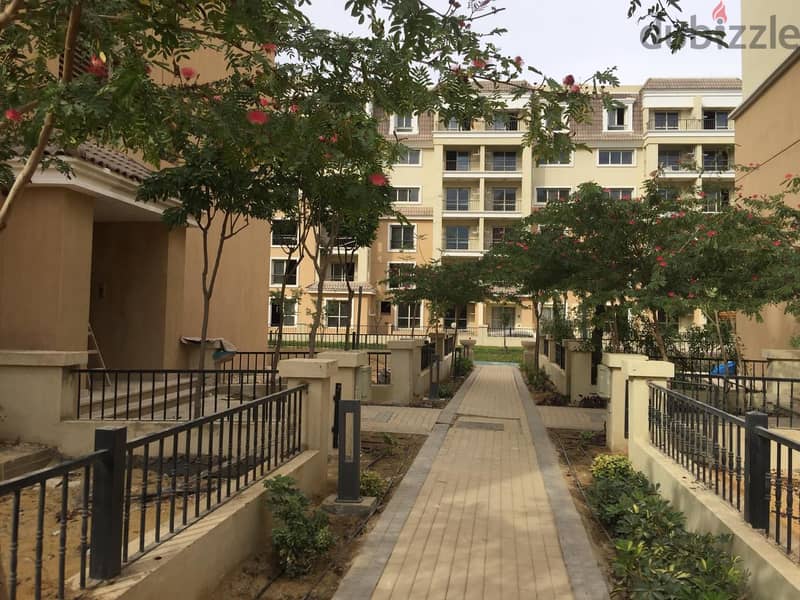 apartment 128m ready to move prime location view on villas , compound sarai 7