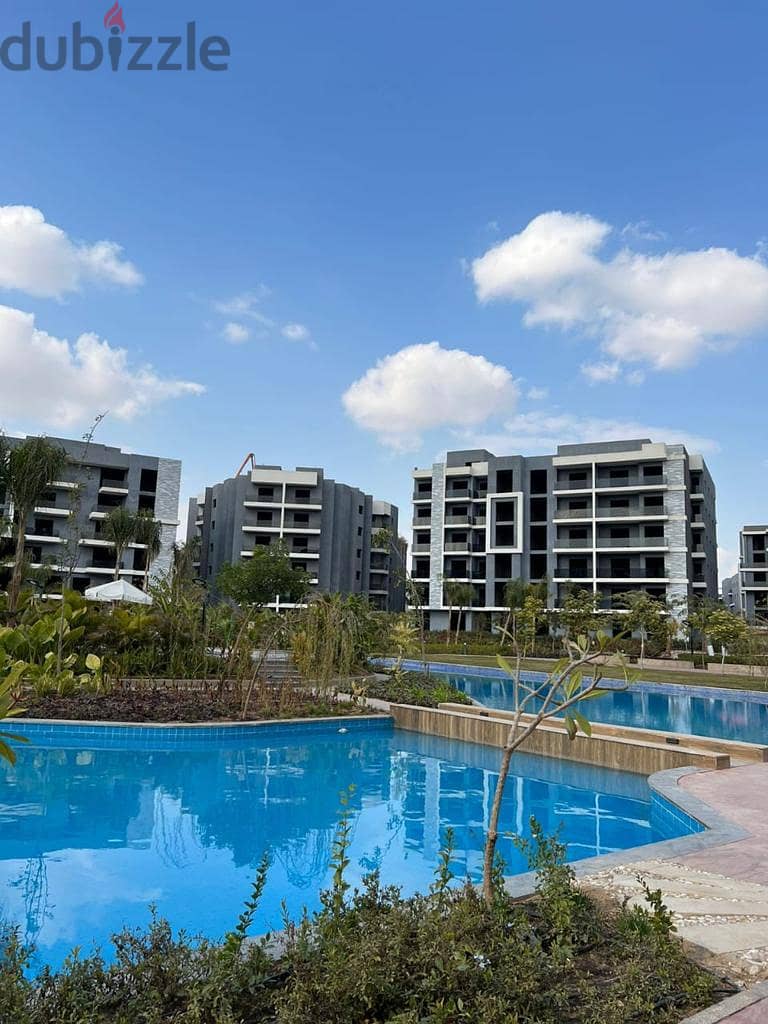 Receive immediately with the lowest down payment. . 144 sqm apartment with garden for sale in installments in 6th of October in Sun Capital October 1
