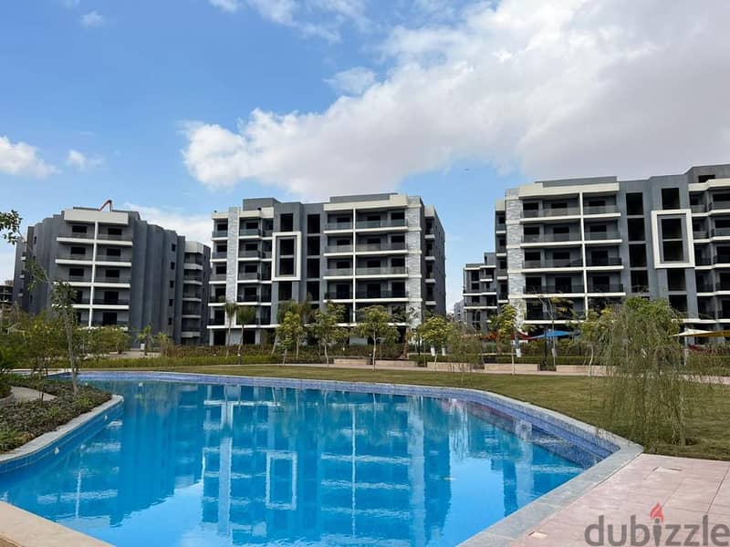 Receive immediately with the lowest down payment. . 144 sqm apartment with garden for sale in installments in 6th of October in Sun Capital October 3