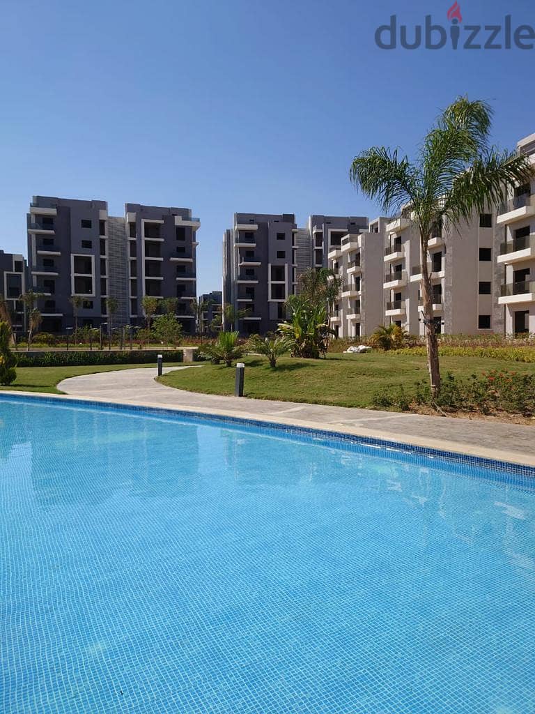 Receive immediately with the lowest down payment. . 144 sqm apartment with garden for sale in installments in 6th of October in Sun Capital October 6