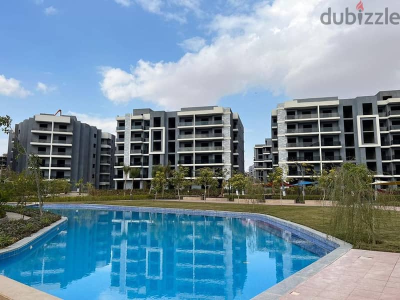 Receive immediately with the lowest down payment. . 156 sqm apartment with garden for sale in installments in 6th of October in Sun Capital October 8