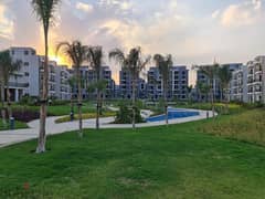 Receive immediately with the lowest down payment. . 157 sqm apartment with garden for sale in installments in 6th of October in Sun Capital October