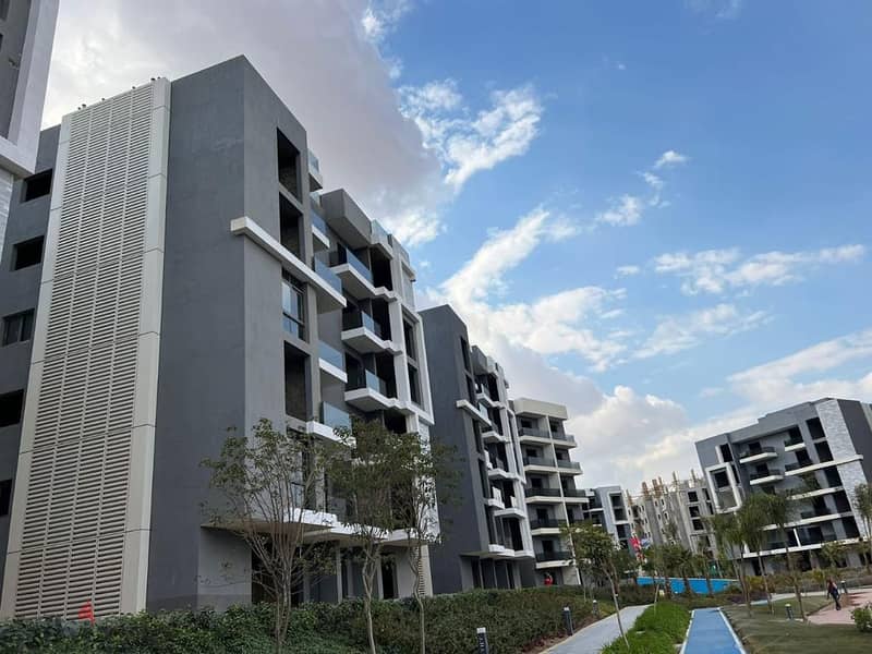 Receive immediately with the lowest down payment. . 156 sqm apartment with garden for sale in installments in 6th of October in Sun Capital October 11