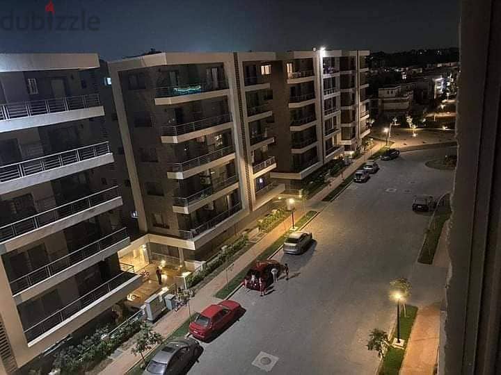 Apartment with 130 square meters and a 45 square meter garden for sale, located in front of Cairo International Airport, available for installment. 3