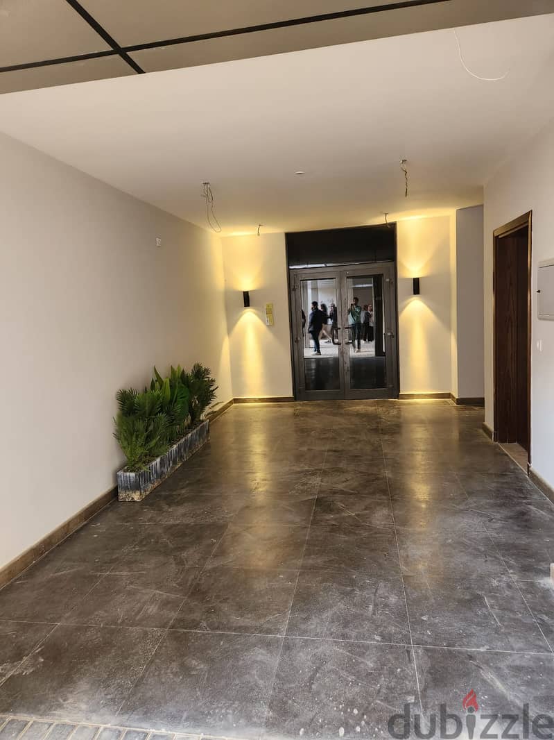 Fully finished apartment with air conditioners in Sheikh Zayed on Nozha Street in ZedWest Compound 9
