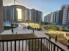For sale, a fully finished apartment with hotel management in Zed Towers, Sheikh Zayed, next to Hyper One from Ora Company, by engineer Naguib Sawiris