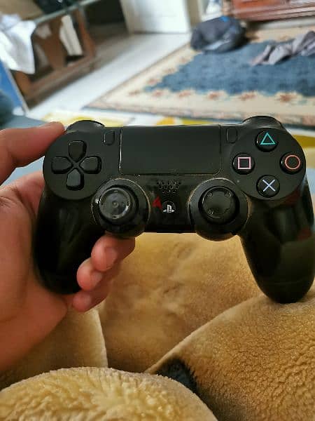 ps4 fat with two controllers with good condition software 11.50 2