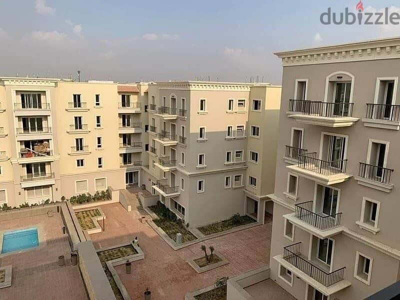 Finished apartment with air conditioners for sale in the heart of Sheikh Zayed, Village West Compound by Dora 4