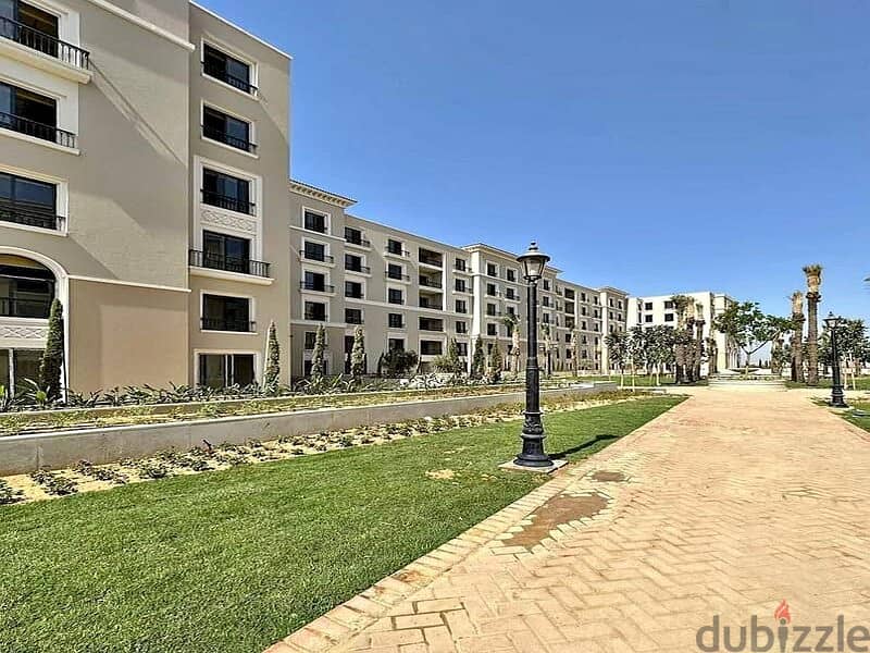 Finished apartment with air conditioners for sale in the heart of Sheikh Zayed, Village West Compound by Dora 7