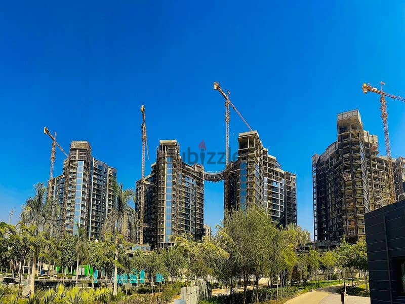 Finished apartment with air conditioners and kitchen, with a view from the 30th floor, with a view open to the landscape, in Zed Towers in New Cairo. 11