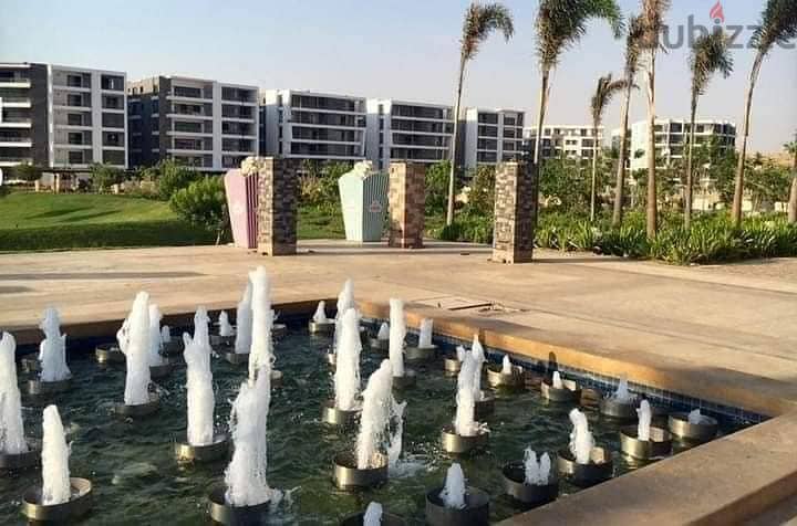 Very special location in front of Cairo Airport, 9 minutes to the community, 137 sqm apartment on direct view + 100 sqm garden for sale in Taj City Co 5
