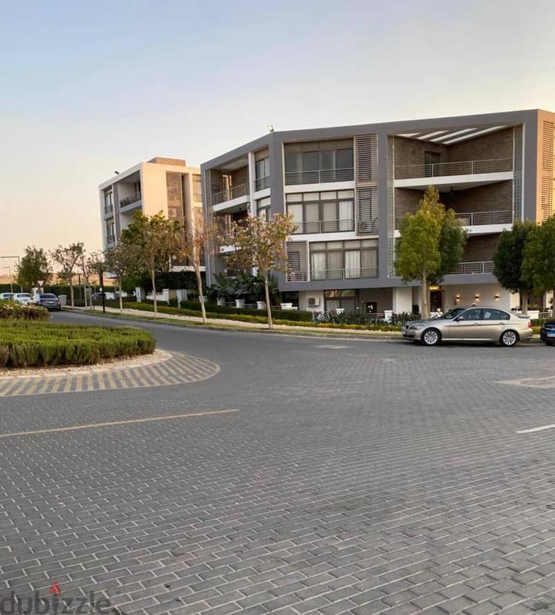 Very special location in front of Cairo Airport, 9 minutes to the community, 137 sqm apartment on direct view + 100 sqm garden for sale in Taj City Co 13