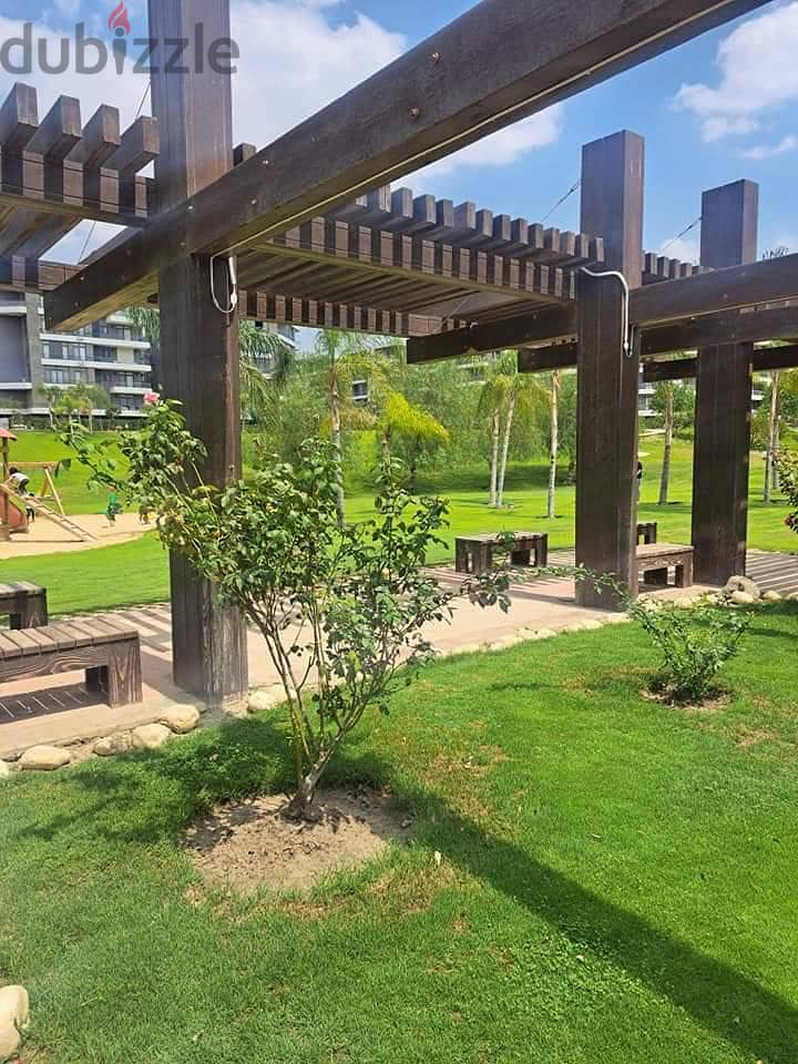 Very special location in front of Cairo Airport, 9 minutes to the community, 137 sqm apartment on direct view + 100 sqm garden for sale in Taj City Co 23