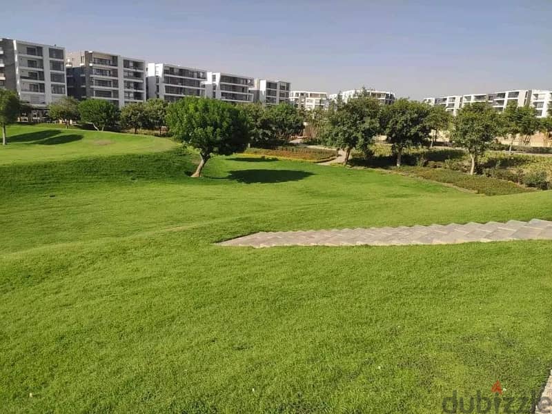 Very special location in front of Cairo Airport, 9 minutes to the community, 137 sqm apartment on direct view + 100 sqm garden for sale in Taj City Co 24