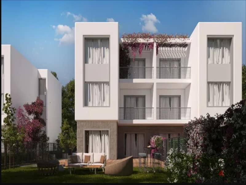 Double view townhouse required 9,000,000/installments - Seasons - 40 minutes from Sidi Abdel Rahman area. 4