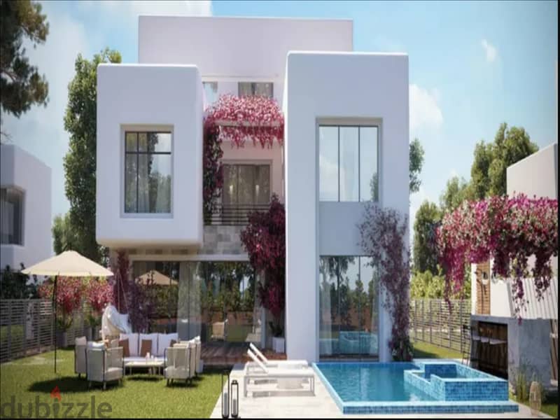 Double view townhouse required 9,000,000/installments - Seasons - 40 minutes from Sidi Abdel Rahman area. 5