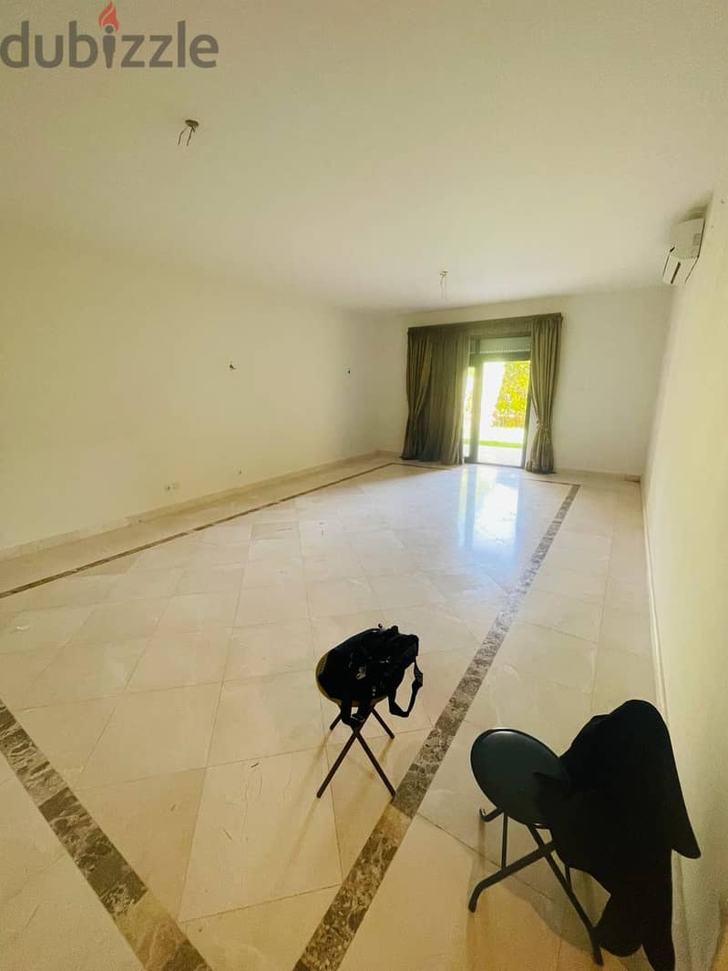 semi furnished apartment with garden 3rooms for rent in Mivida New Cairo 11