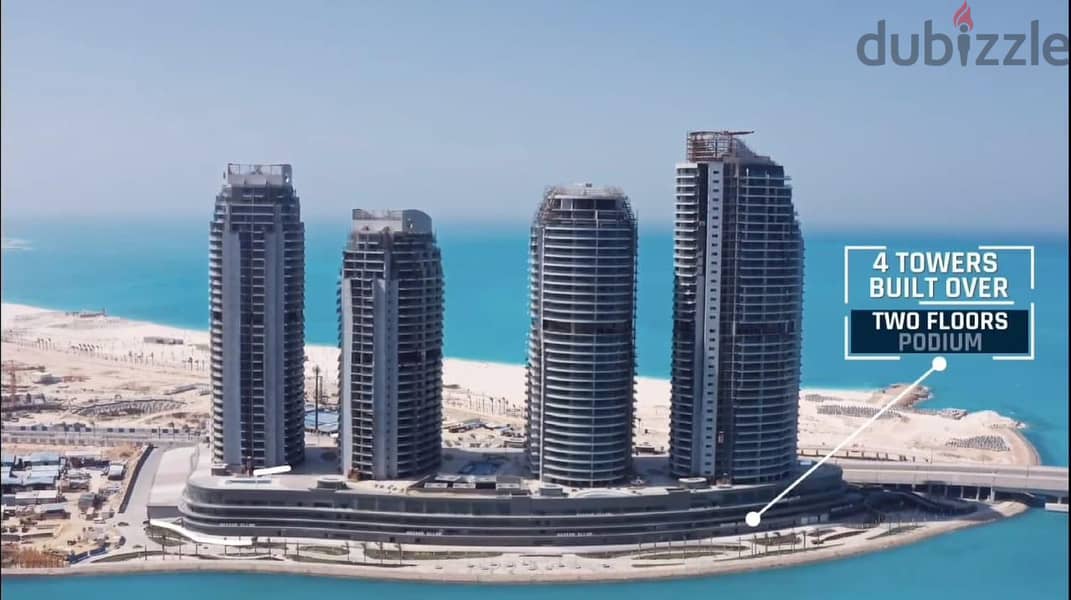 For sale, a finished hotel apartment with air conditioners overlooking the sea, in installments, in El Alamein Towers 1