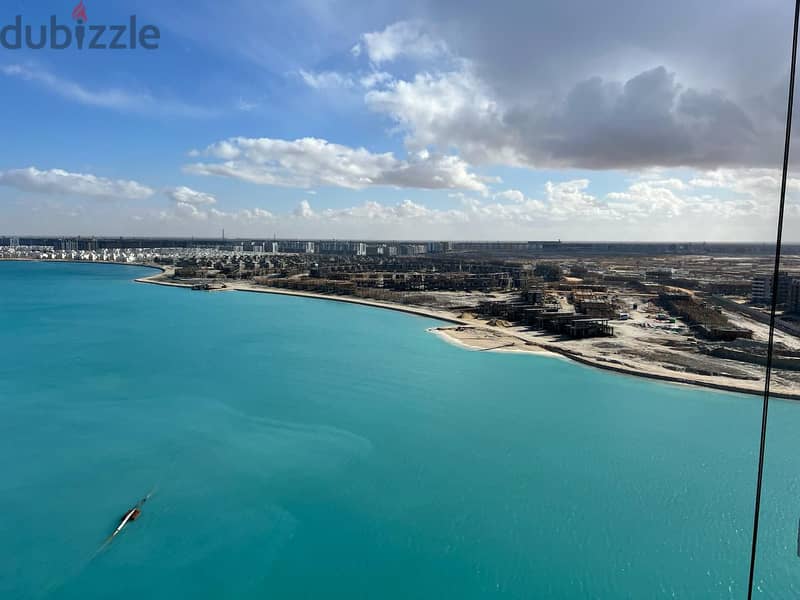For sale, a finished hotel apartment with air conditioners overlooking the sea, in installments, in El Alamein Towers 2