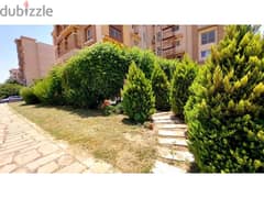 Ground floor apartment with a private garden for sale in the best location in Madinaty, B3.