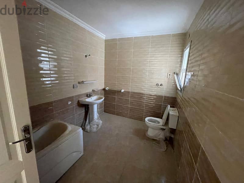 Ground floor apartment with a private garden for sale in the best location in Madinaty, B3. 3