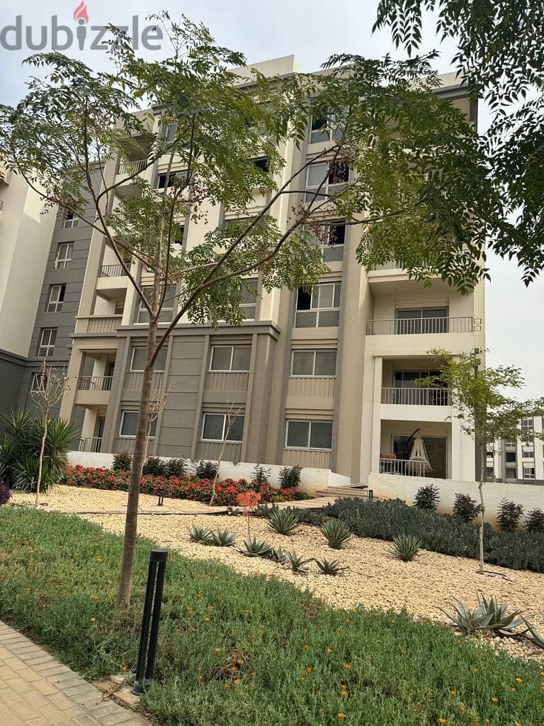 own an  apartment 123 sqm with a garden 42 sqm  in a prime location in Hyde Park, down payment and instalments 11