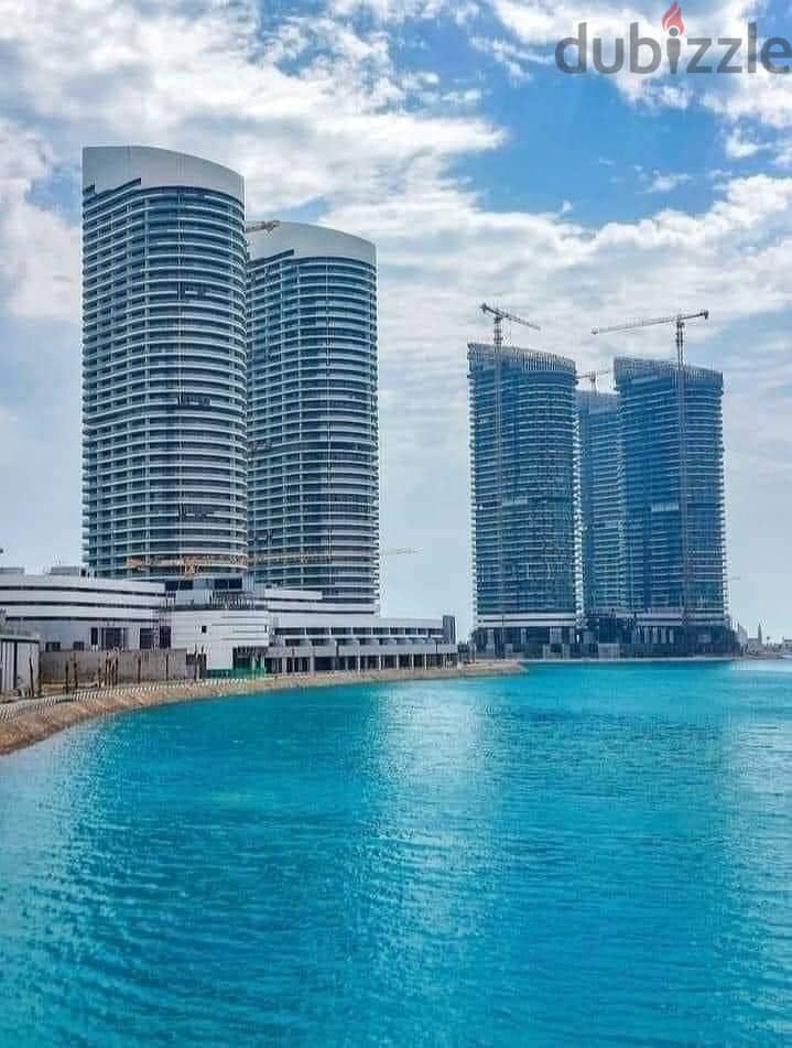 Smart apartment 200 sqm for sale in front of the sea, 4 rooms, fully finished, in El Alamein Towers, North Coast 5