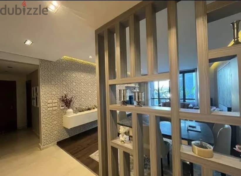 Apartment with garden (immediate receipt + finished) for sale in Fifth Settlement 5