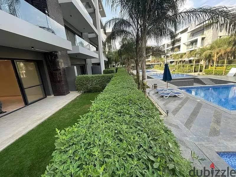 Apartment with garden (immediate receipt + finished) for sale in Fifth Settlement 7