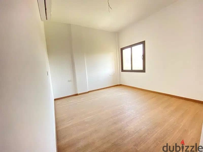 fully finished ground apartment in fifth square شقة متشطبة ارضي بجاردن في الجولدن سكوير بالتكييفات 2