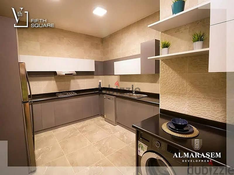 fully finished ground apartment in fifth square شقة متشطبة ارضي بجاردن في الجولدن سكوير بالتكييفات 14
